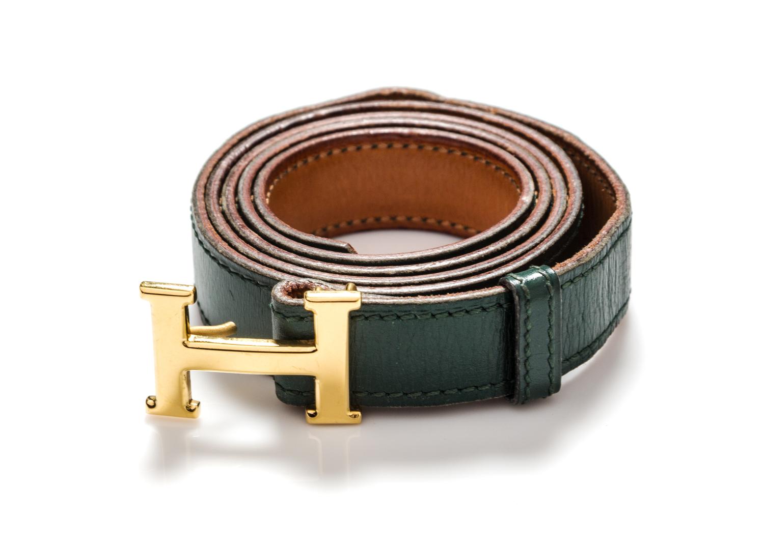 An Hermes Green Leather Mini Constance Belt, 33 inches.