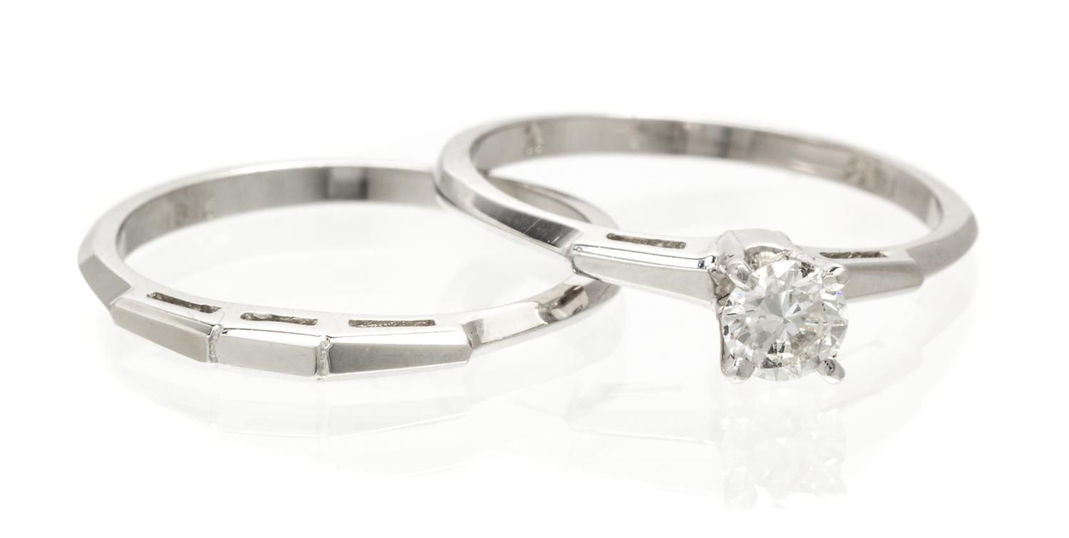 A 18 Karat White Gold and Diamond Ring Set, 2.30 dwts.