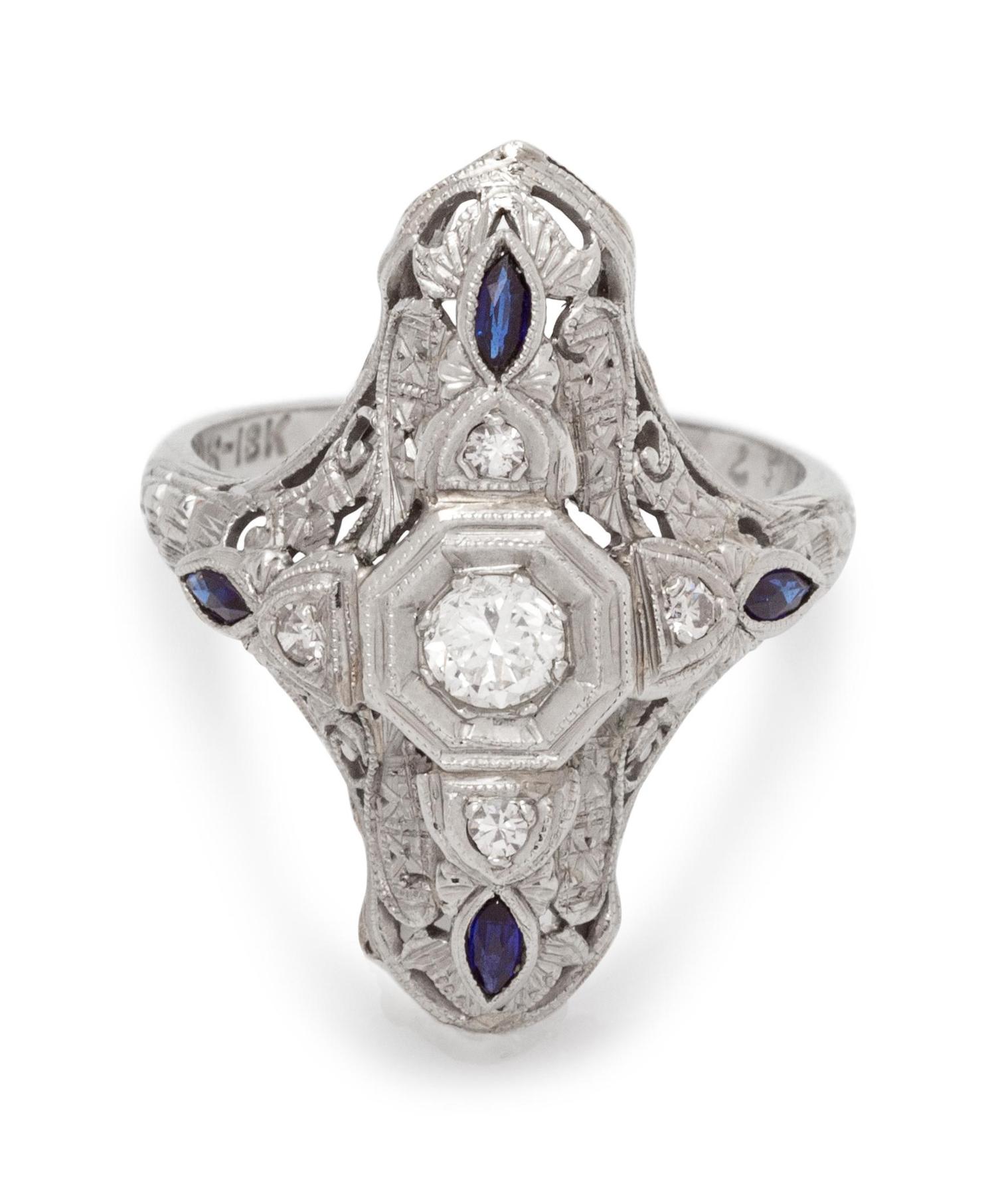 An 18 Karat White Gold, Diamond and Sapphire Ring,