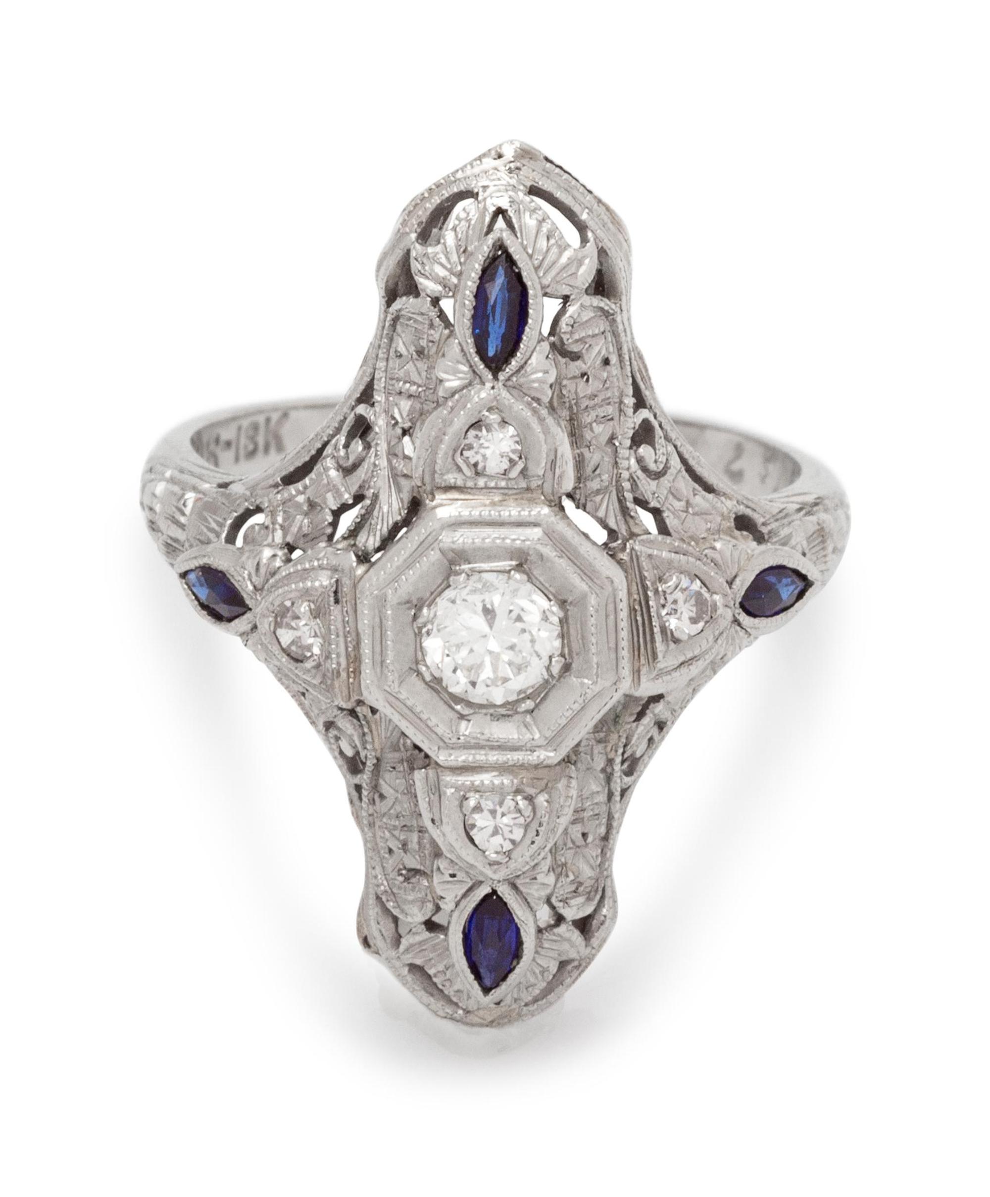 An 18 Karat White Gold, Diamond and Sapphire Ring,