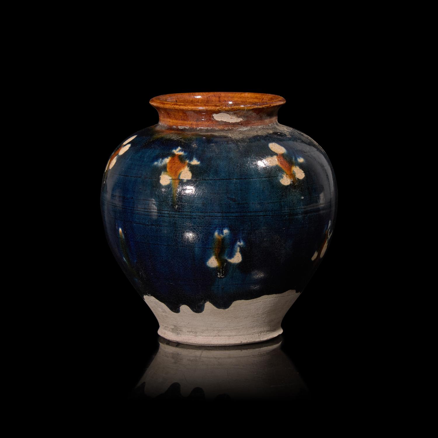A Chinese Sancai Glazed Pottery Jar, Tang Dynasty 唐 三彩罐
