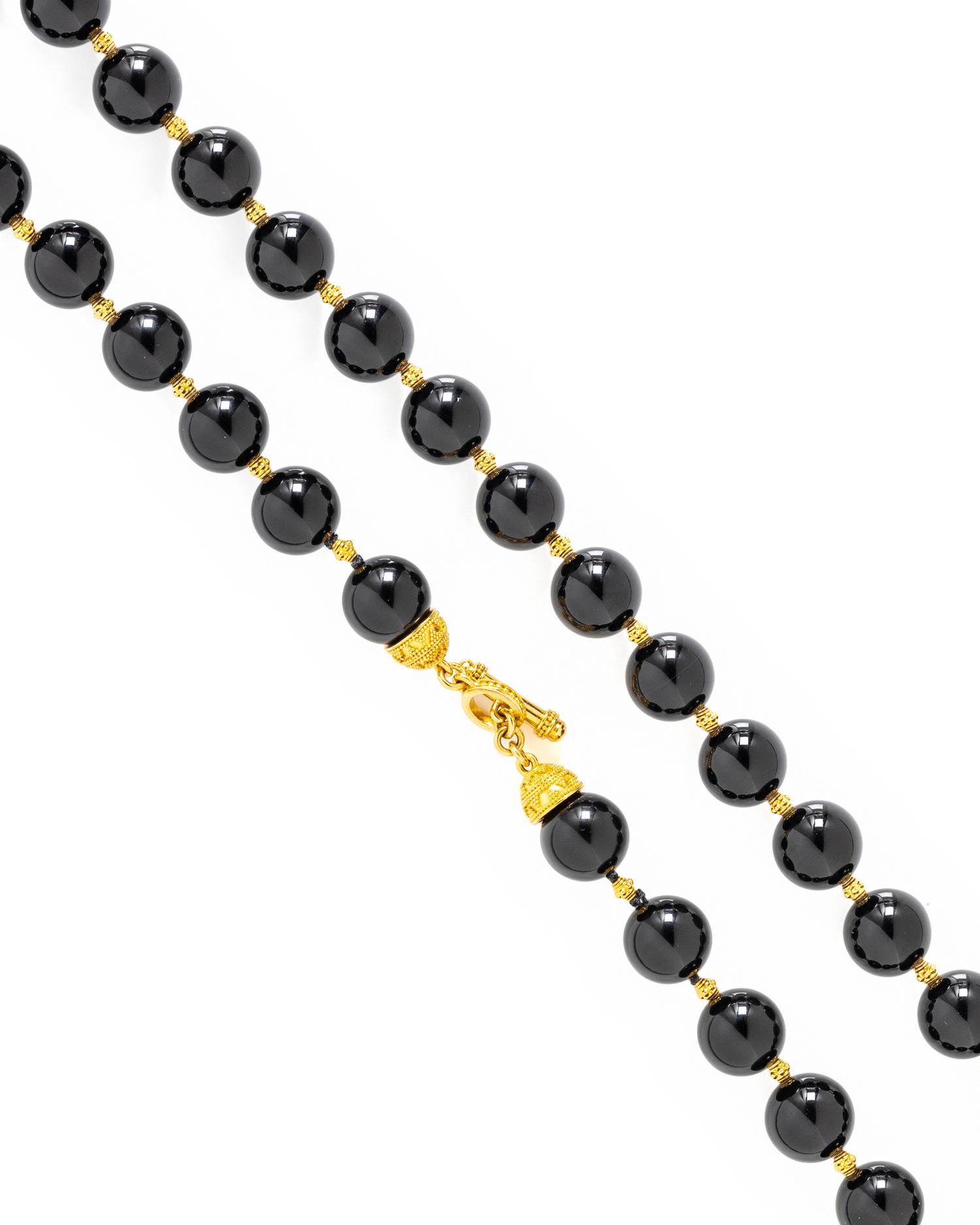 HIGH KARAT YELLOW GOLD AND ONYX BEAD NECKLACE