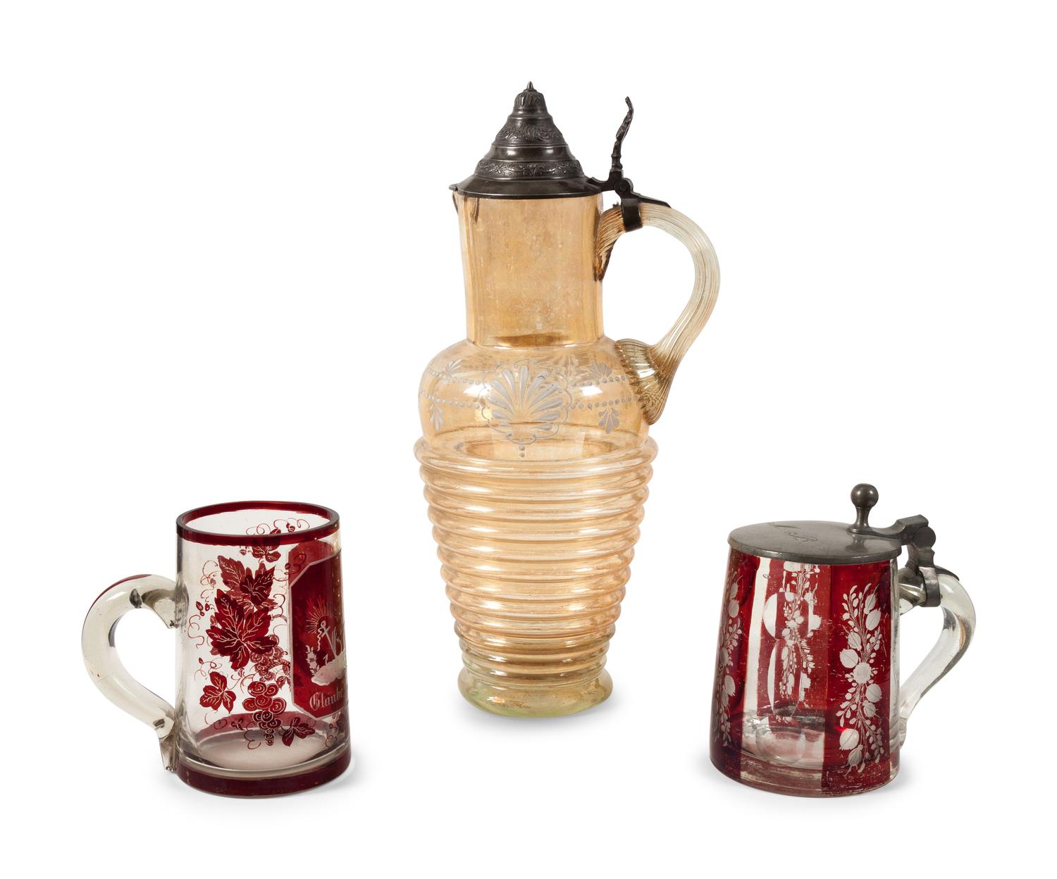 A Collection of Steins and a Large Pitcher