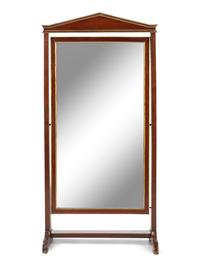 A Continental Parcel Gilt Mahogany Cheval Mirror