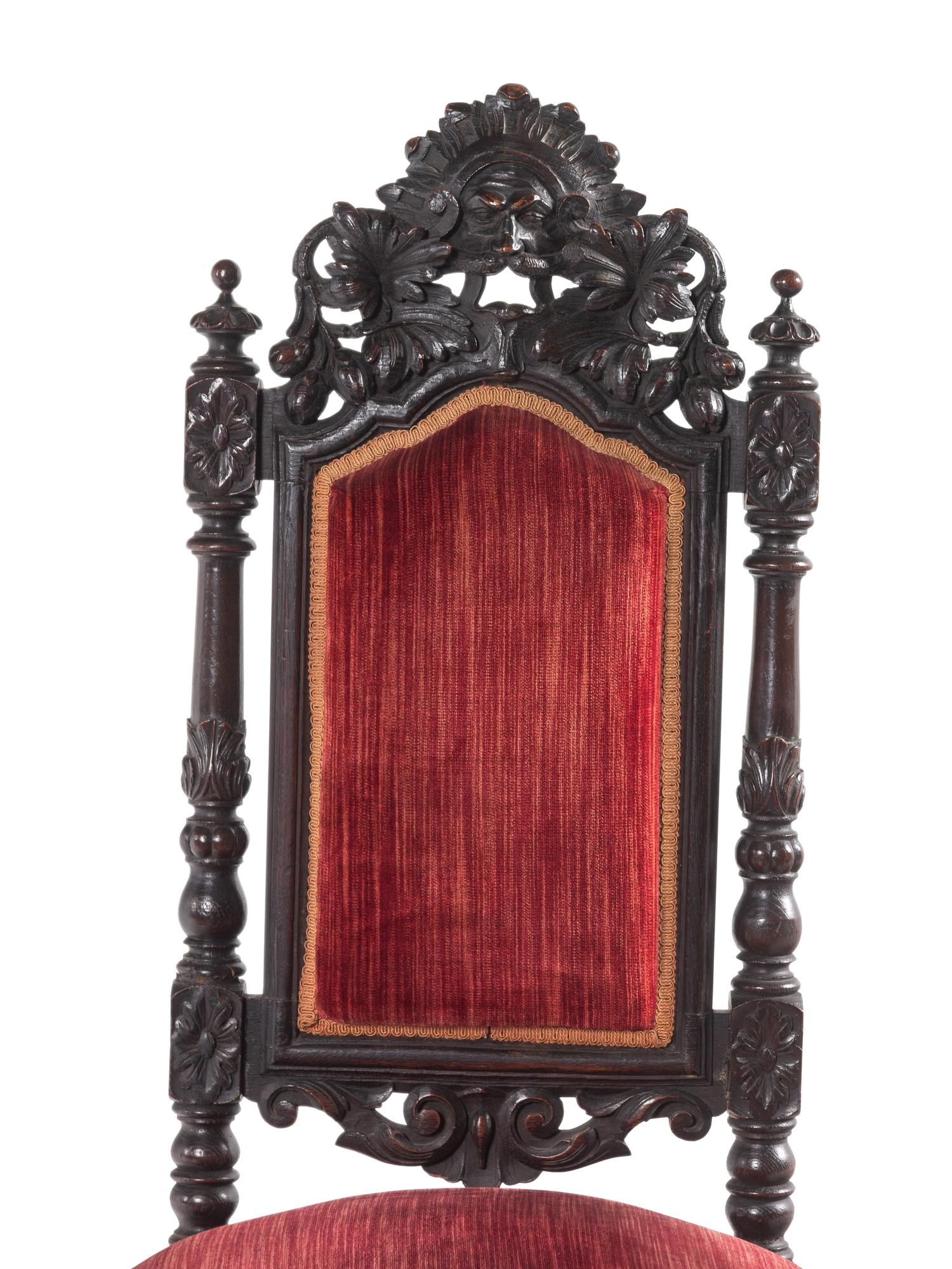 A Set of Ten Renaissance Revival Oak Dining Chairs
