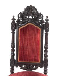 A Set of Ten Renaissance Revival Oak Dining Chairs