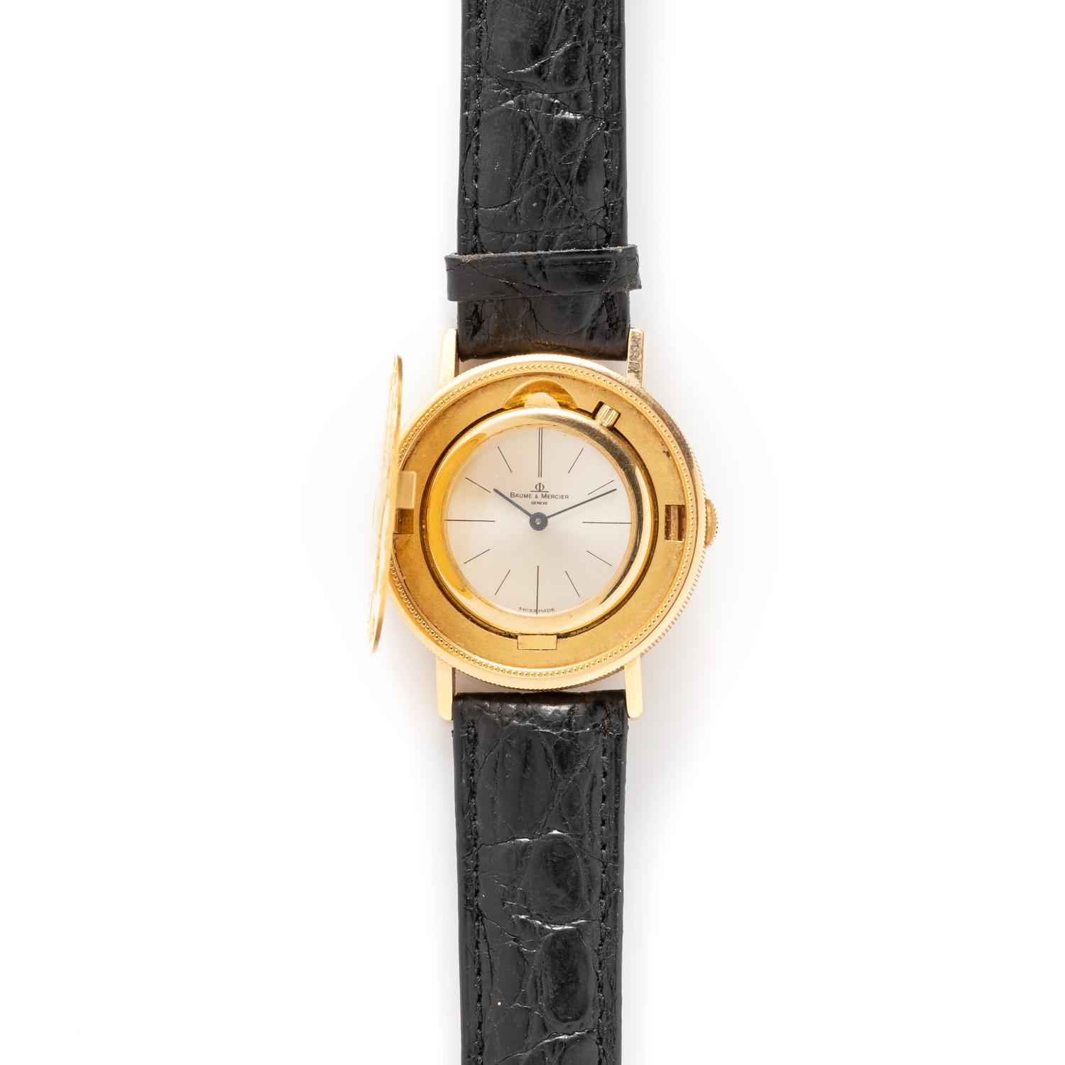 BAUME & MERCIER, YELLOW GOLD HIDDEN DIAL COIN WATCH