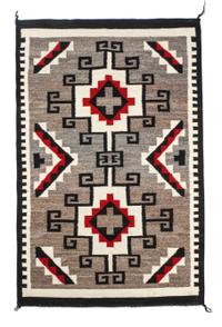 Two Western Reservation Navajo Rugs First: 60 x 31 inches. — SECOND QUARTER 20TH CENTURY