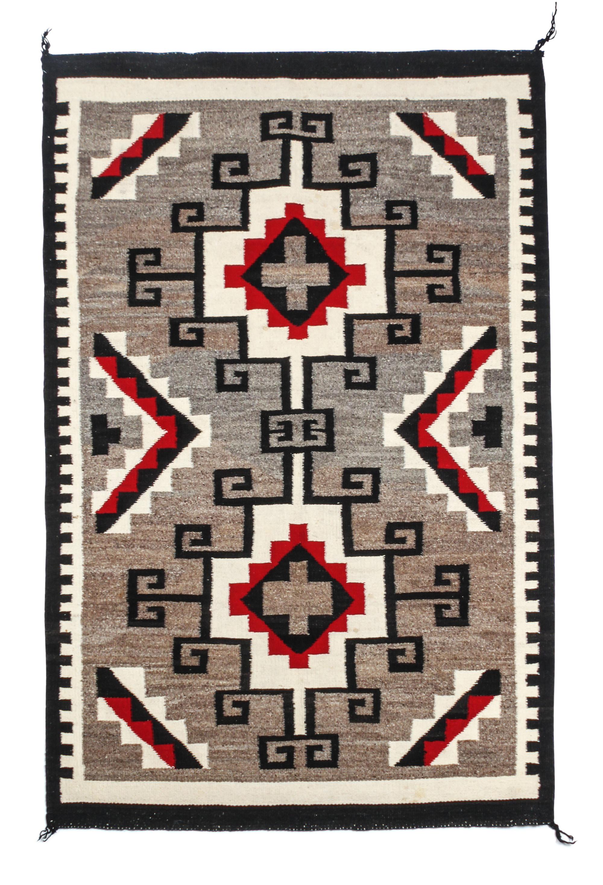 Two Western Reservation Navajo Rugs First: 60 x 31 inches. — SECOND QUARTER 20TH CENTURY