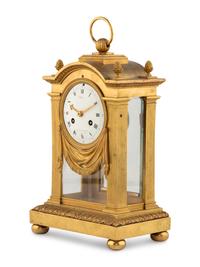 A Louis XVI Gilt Bronze Mantel Clock