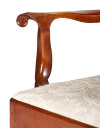 A Queen Anne Carved Walnut Armchair