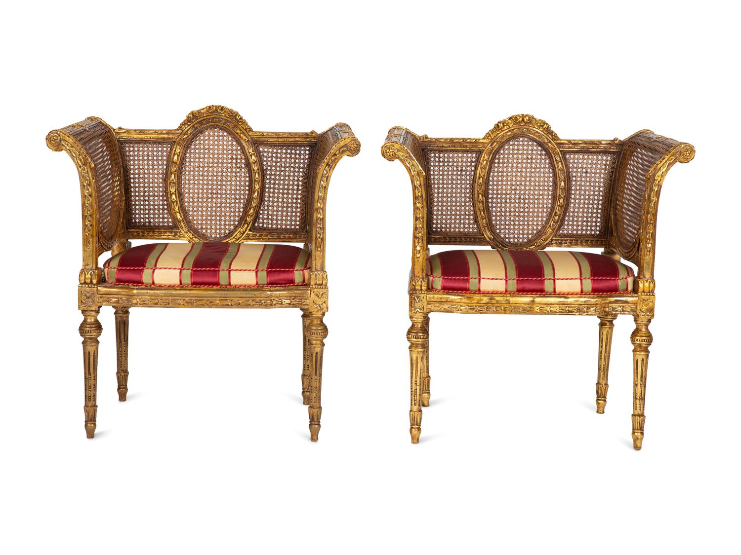 A Pair of Louis XVI Style Giltwood Cane-Back Benches