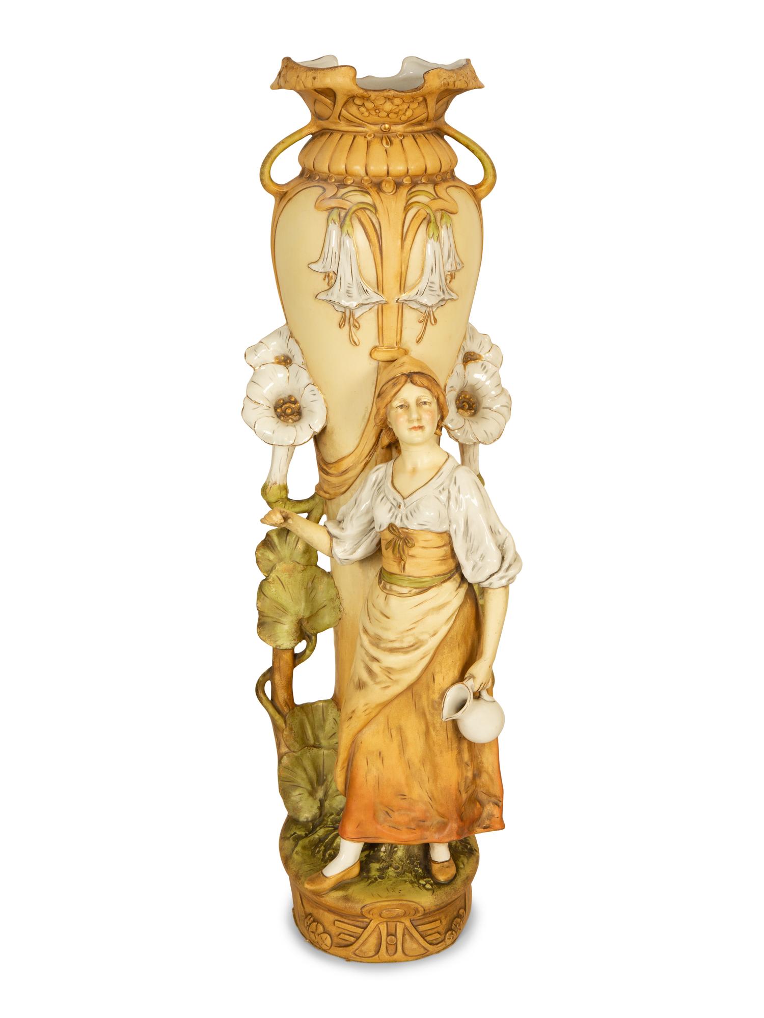 A Pair of Royal Dux Porcelain Figural Vases