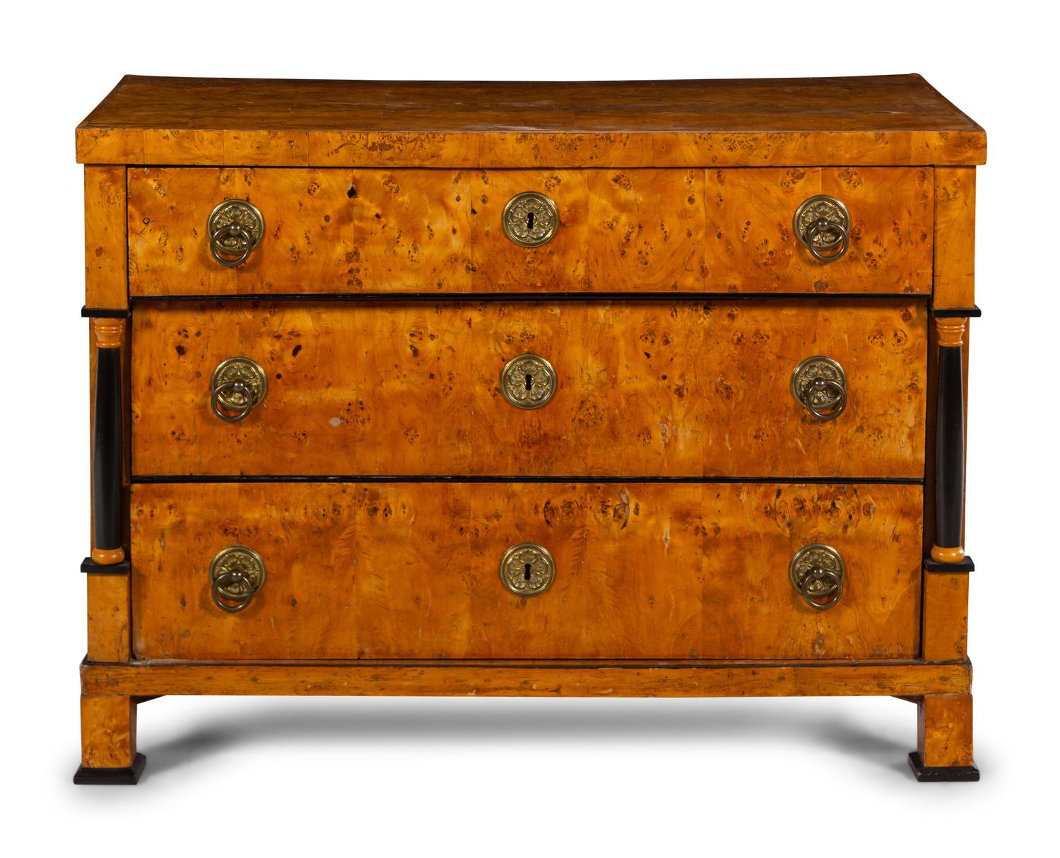 An Austrian or Northern European Parcel Ebonized Burlwood Commode