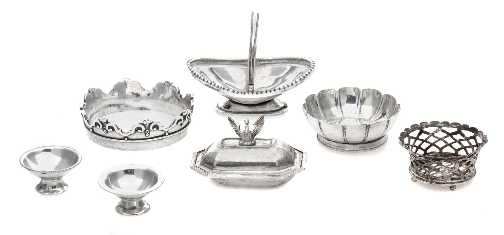 A Collection of Seven English Silver Table Articles, Various Makers, comprising a covered entree dish with a phoenix form finial; a cen