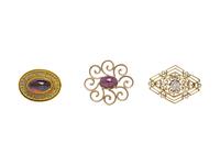 COLLECTION OF YELLOW GOLD BROOCHES