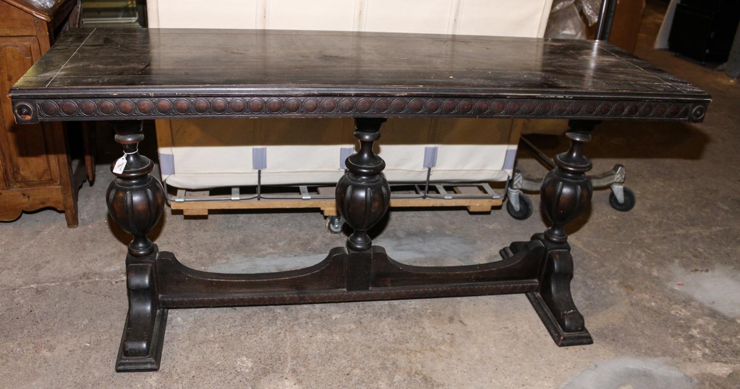 An American Renaissance Revival Library Table Height 29 x width 59 1/2 x depth 19 1/2 inches. — FIRST HALF 20TH CENTURY