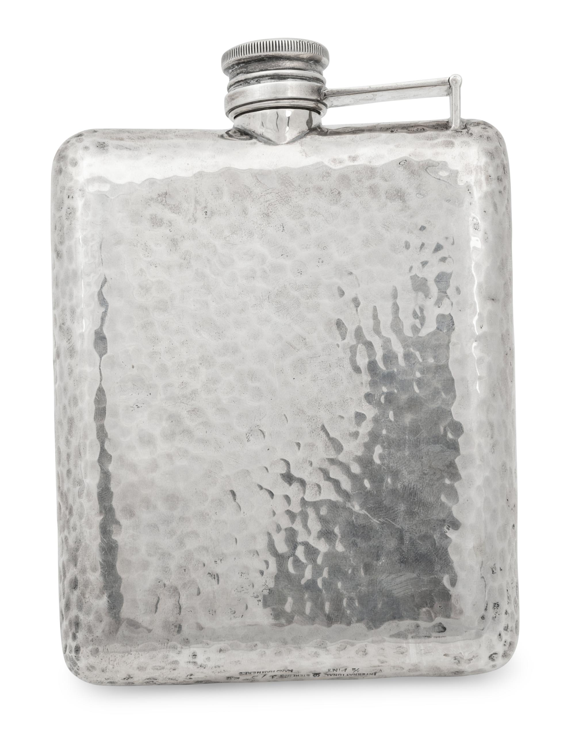An International Hammered Silver Flask