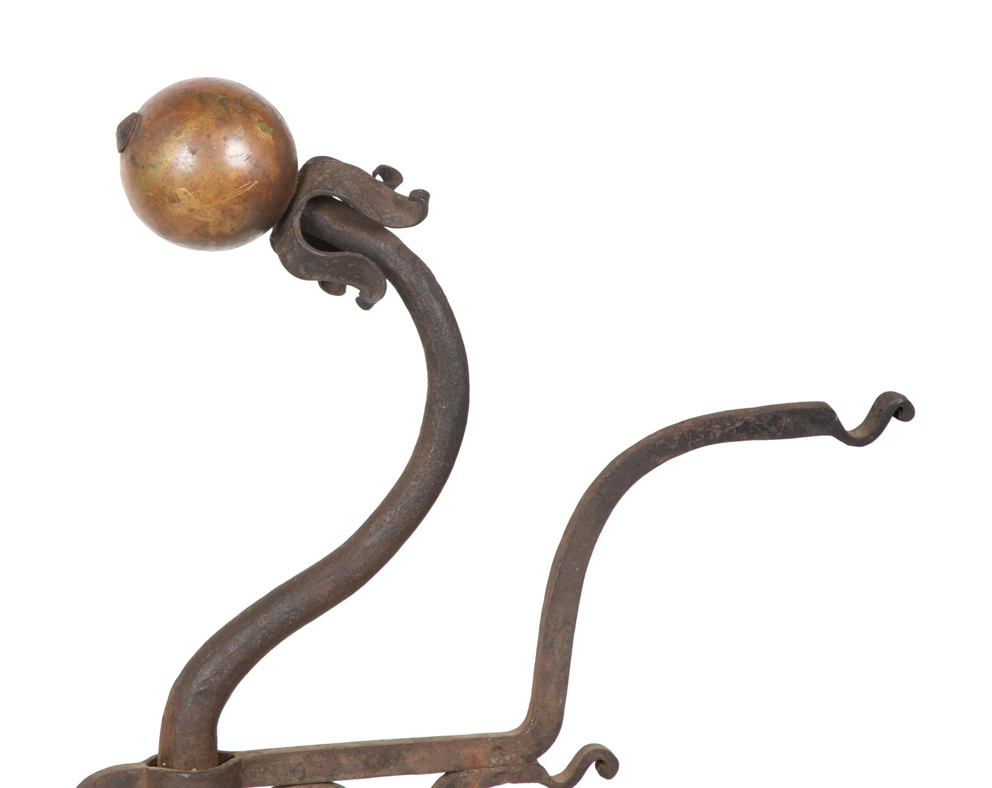 A Pair of Continental Iron Large Andirons — 19TH CENTURY