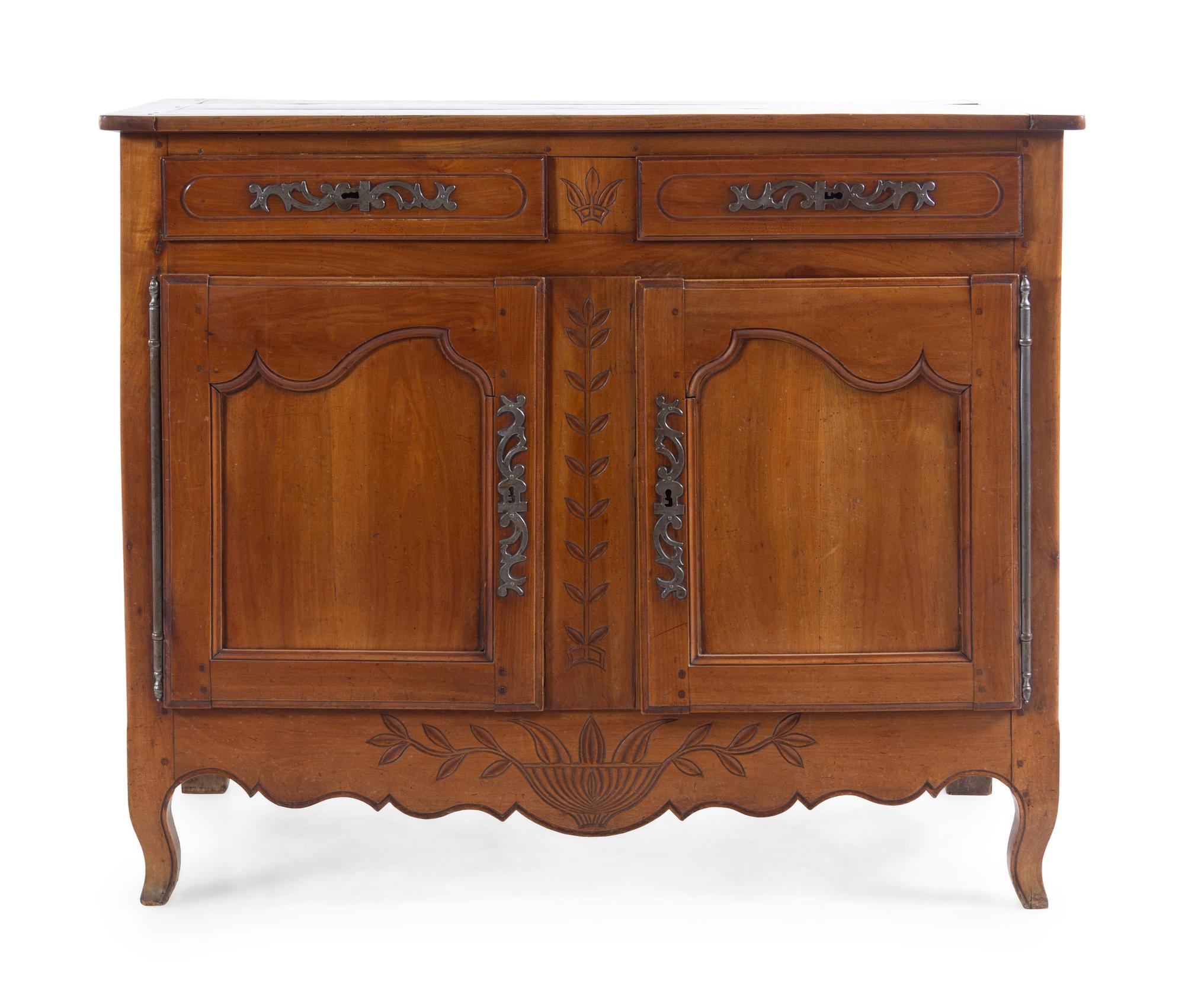 A Louis XV Provincial Walnut Cabinet