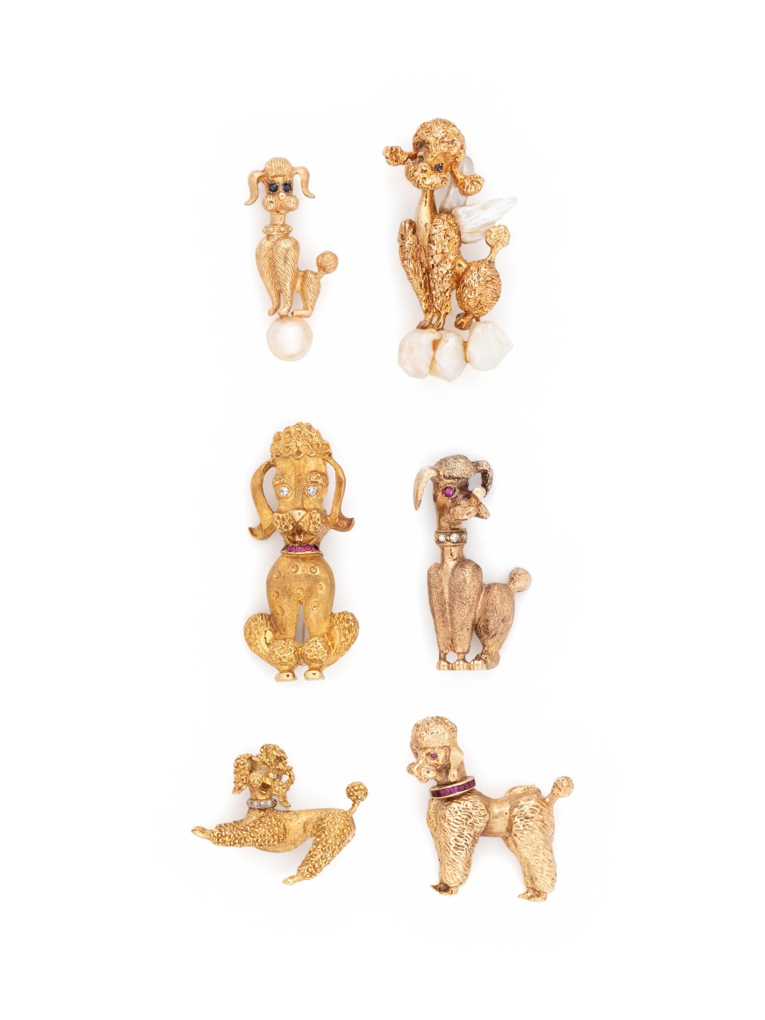 COLLECTION OF YELLOW GOLD POODLE BROOCHES