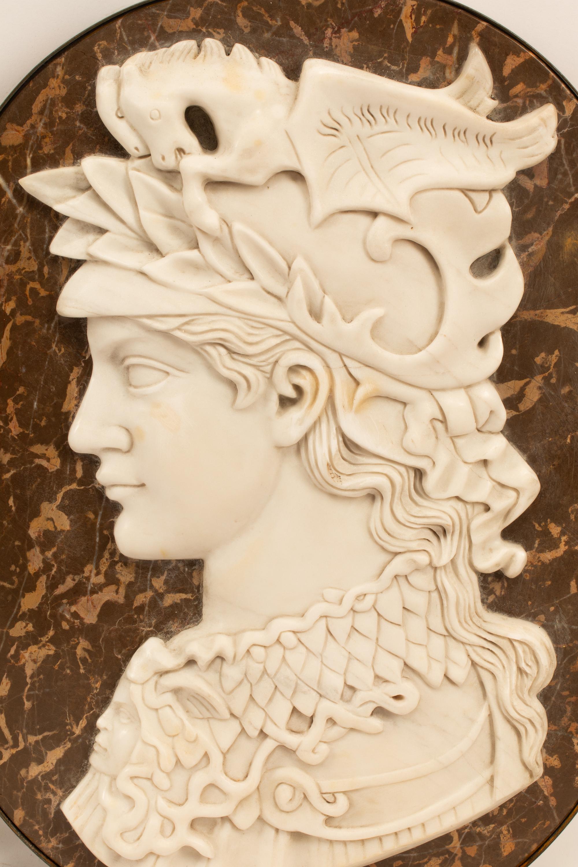 A Set of Four Iron-Framed Marble Portrait Medallions