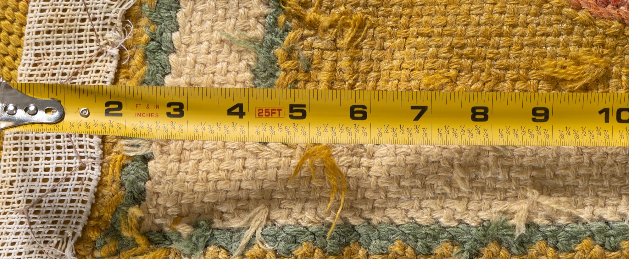 A Continental Needlepoint Rug