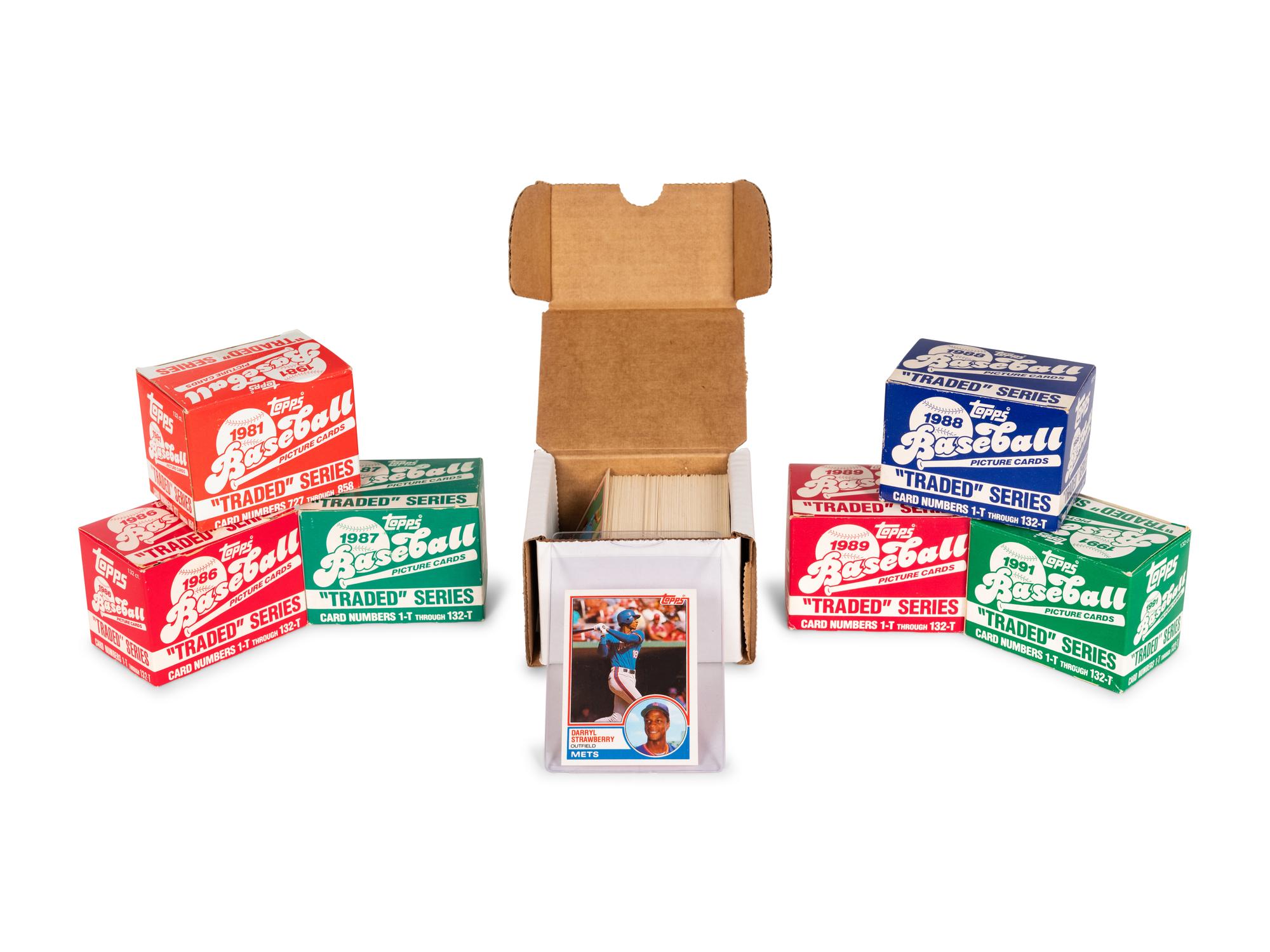 A Group of Seven 1980s-90s Topps Traded Baseball Card Sets,