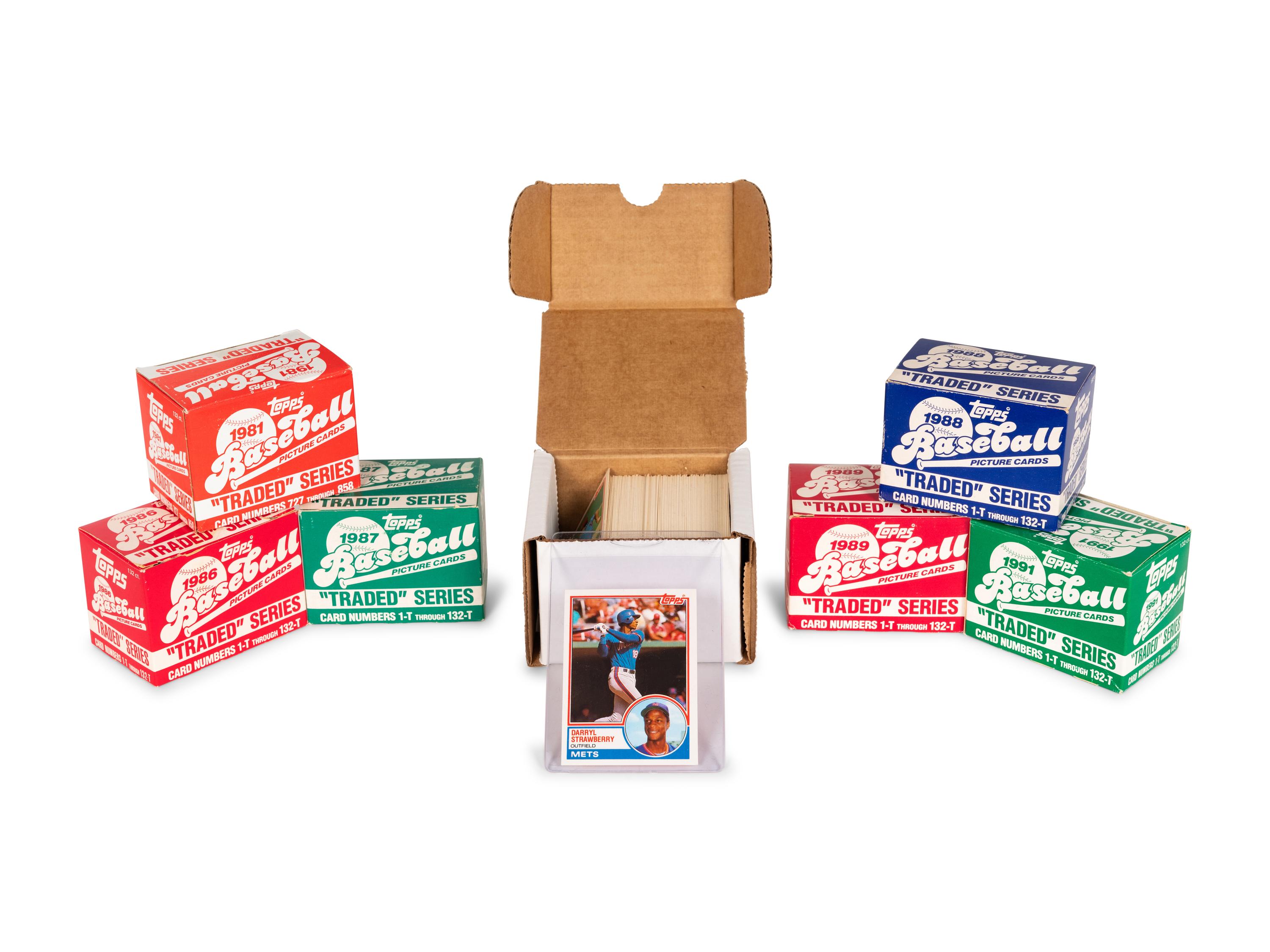 A Group of Seven 1980s-90s Topps Traded Baseball Card Sets,