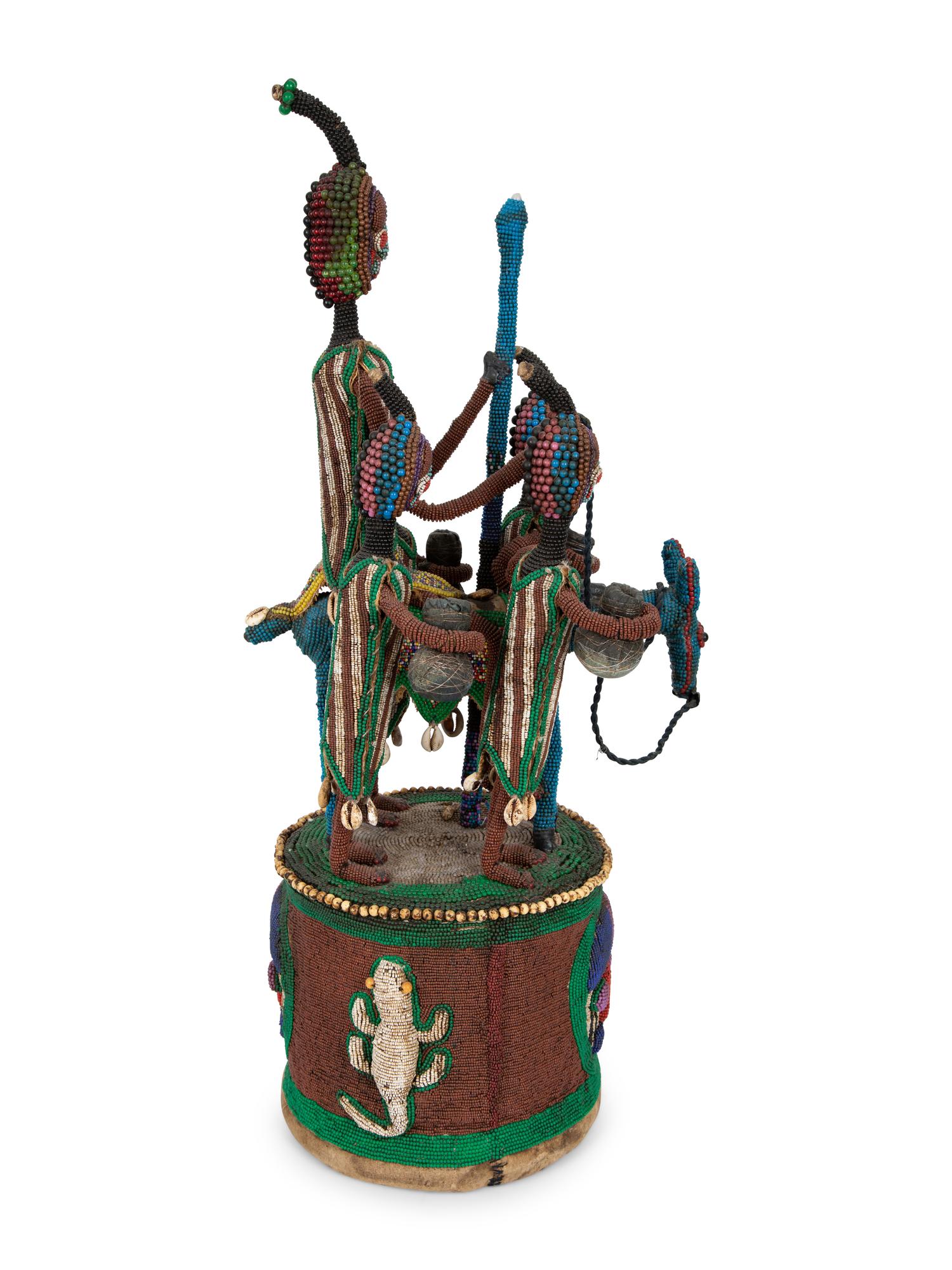 A Group of Three Yoruba Beaded Headdresses and Two Talisman Panels — 20TH CENTURY