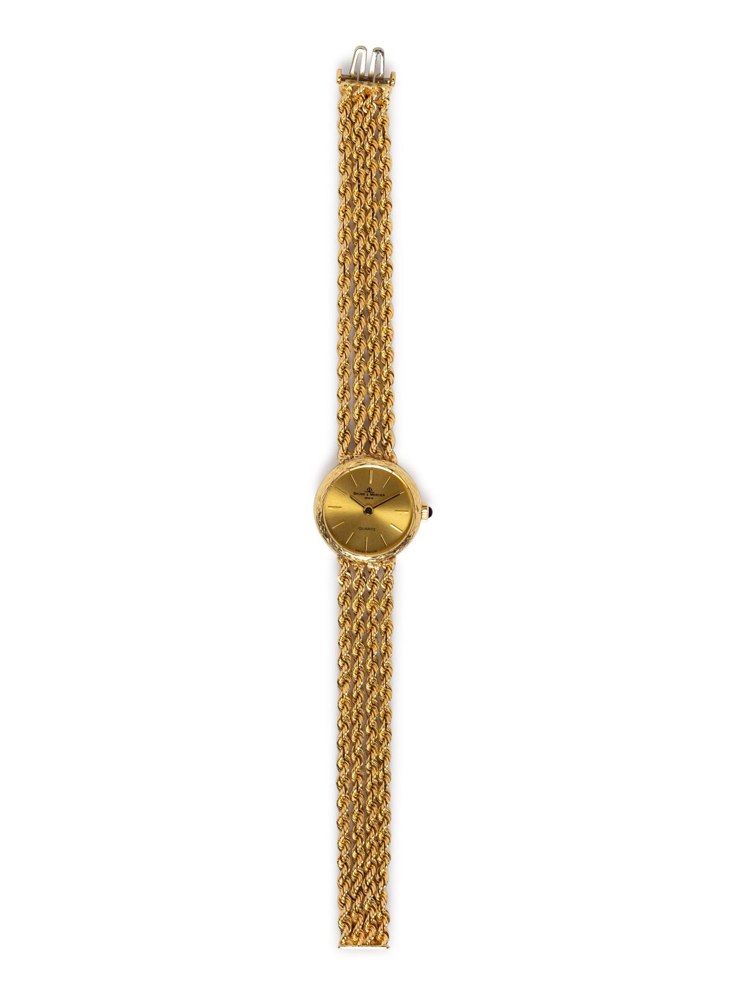 A 14 Karat Yellow Gold Wristwatch, Baume & Mercier,