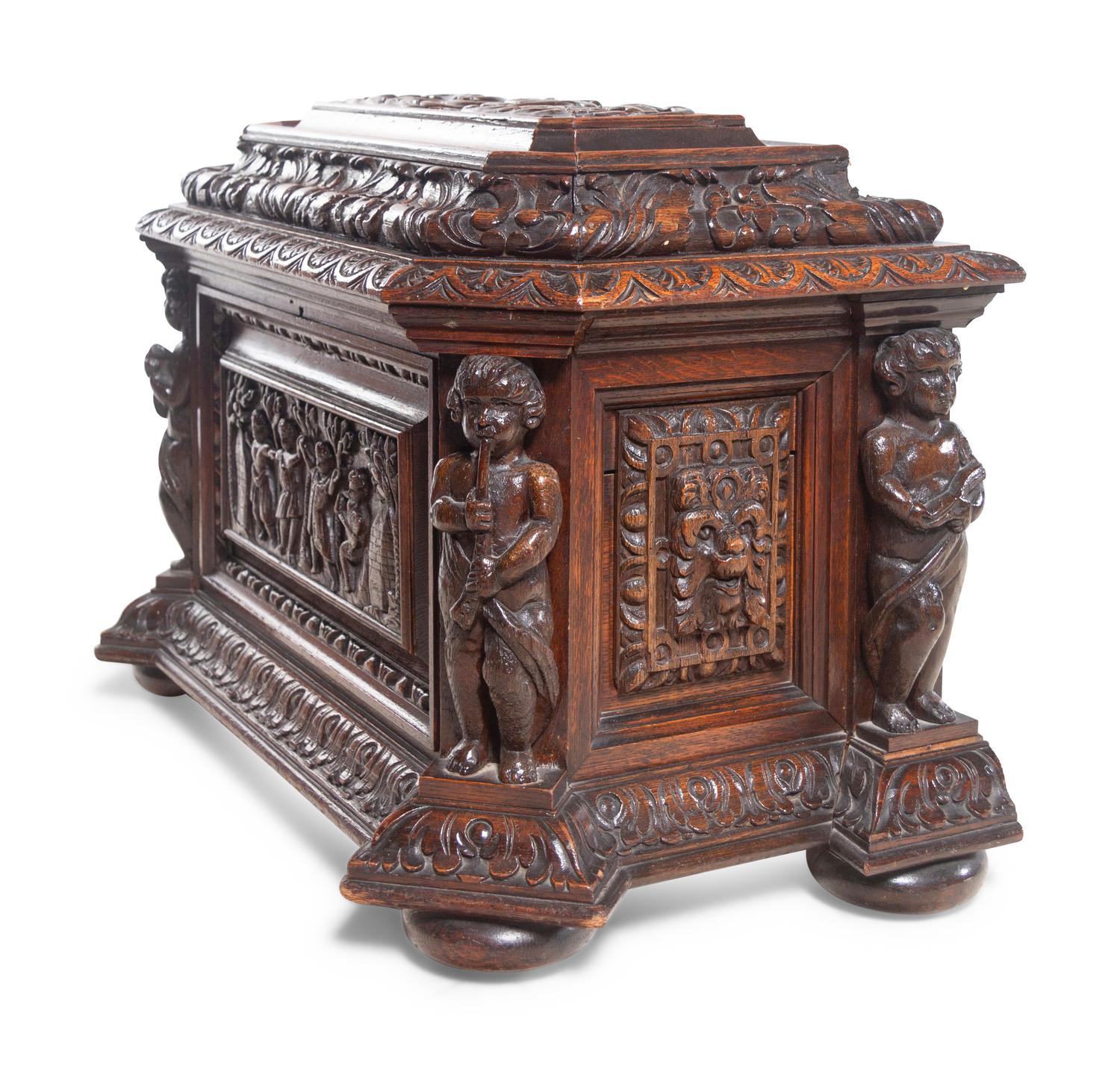 A Renaissance Revival Carved Oak Cellarette