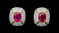 A Pair of 18 Karat Gold, Ruby and Diamond Earrings, 6.20 dwts.