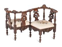 A Renaissance Revival Walnut Tete-A-Tete