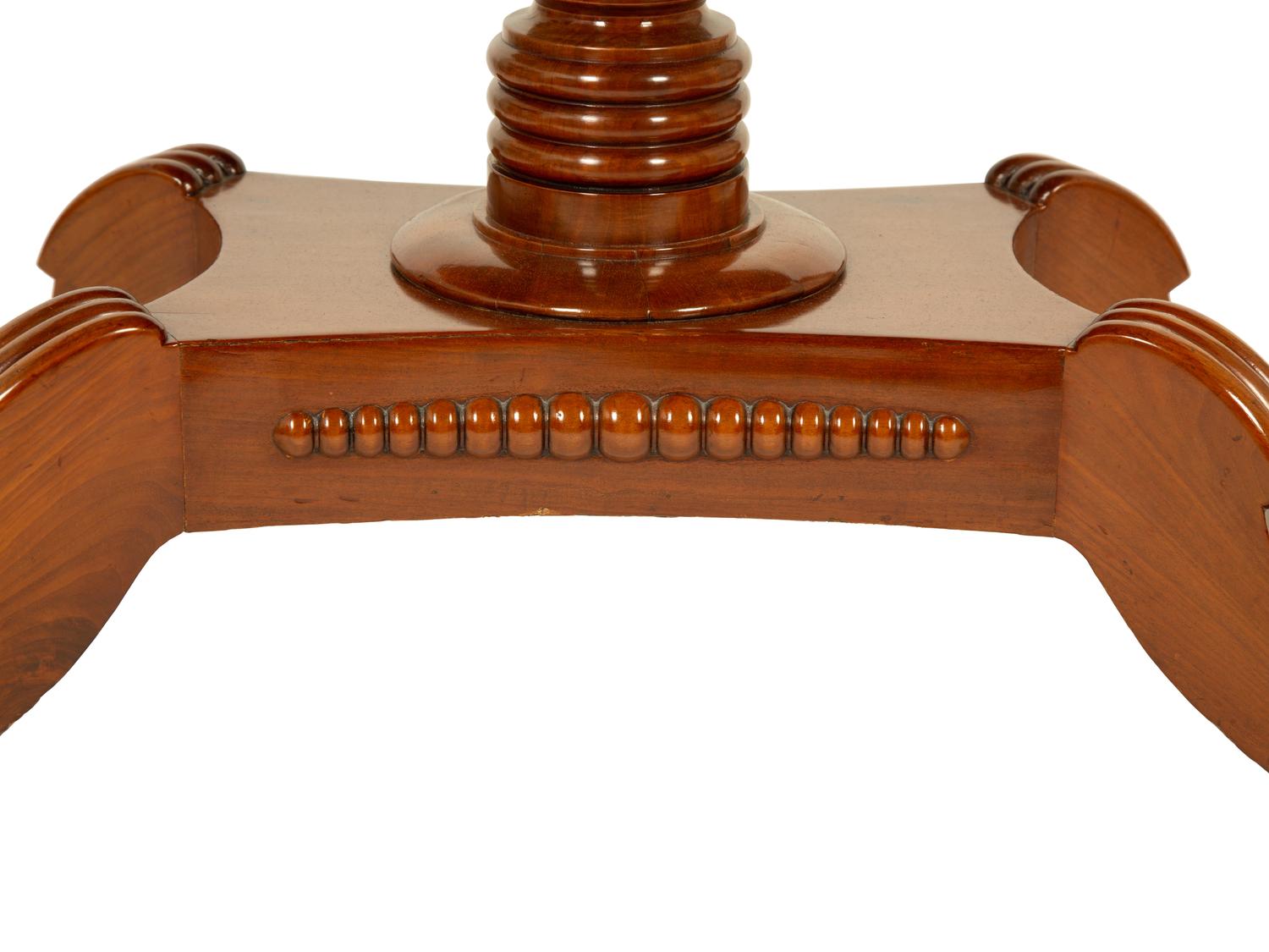 A Pair of Regency Flame Mahogany Flip-Top Games Tables — 19TH CENTURY
