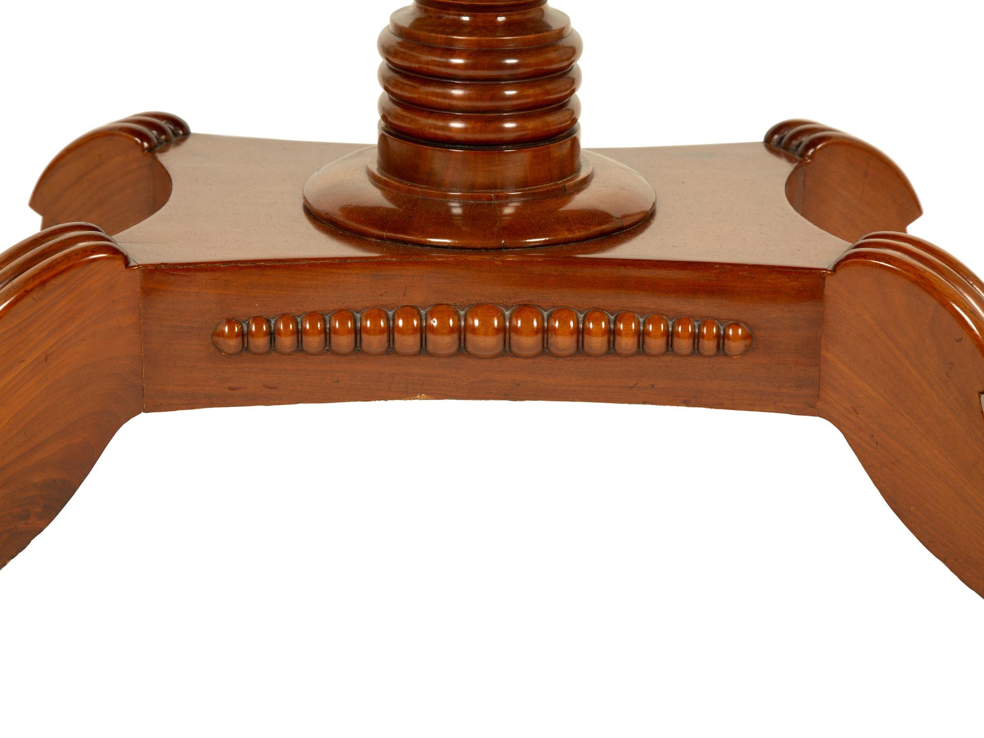 A Pair of Regency Flame Mahogany Flip-Top Games Tables — 19TH CENTURY