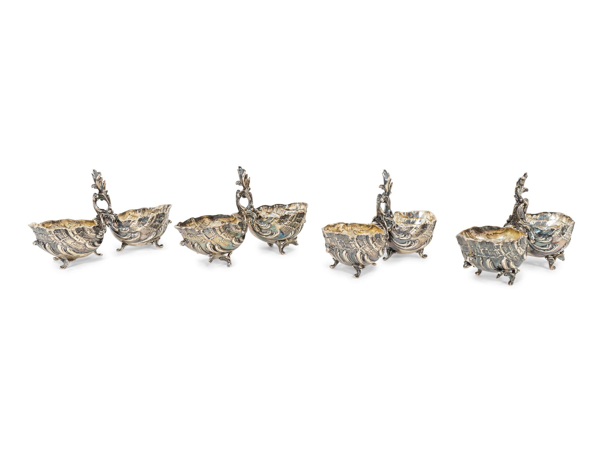 A Set of Four French Silver Double-Salts and Two Pairs of German Silver Salt and Pepper Casters