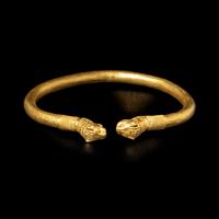 A Greek or Achaemenid Gold Bracelet with Lion Terminals