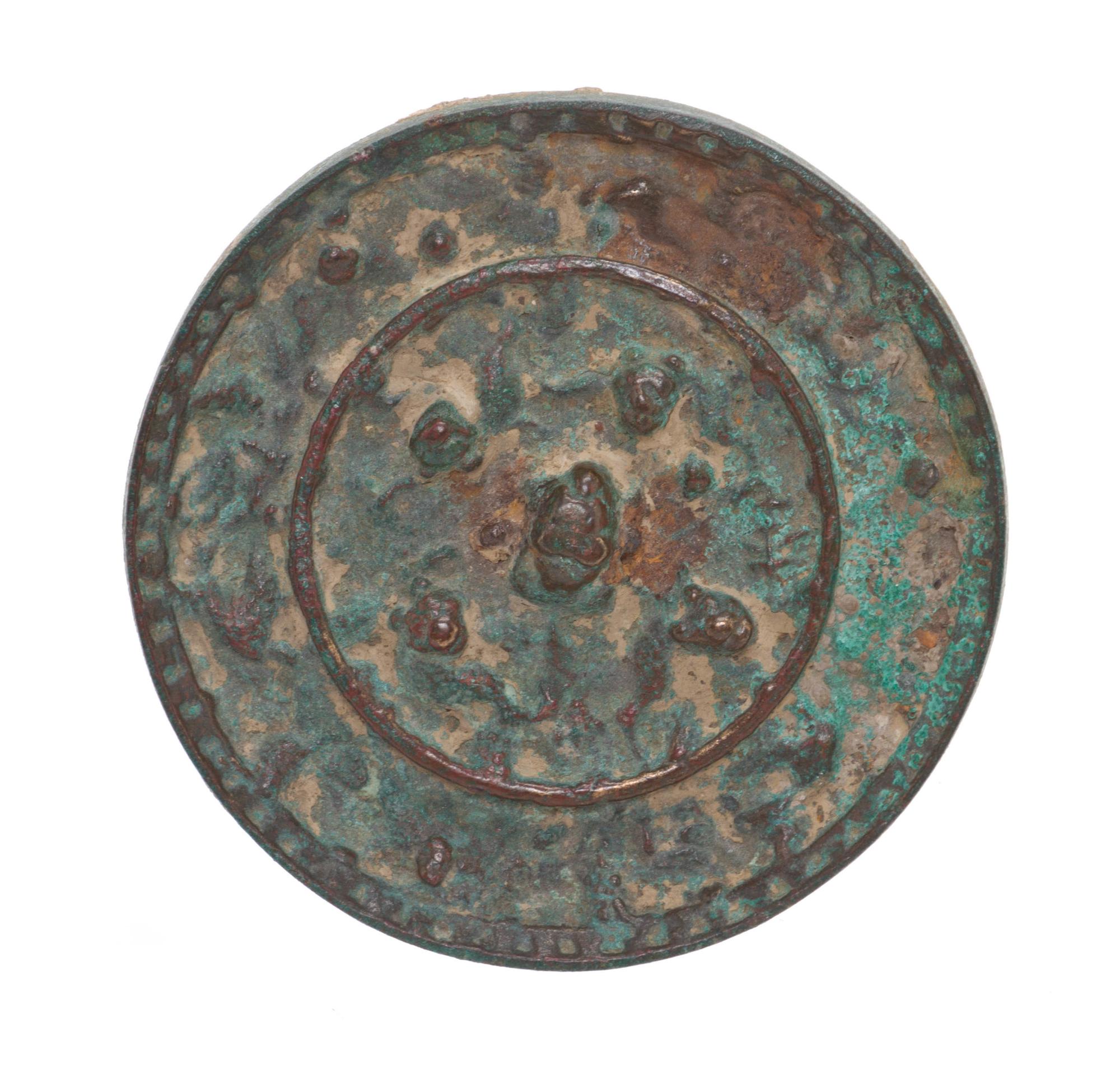 A Chinese Bronze Disc Mirror, Diameter 4 1/8 inches.