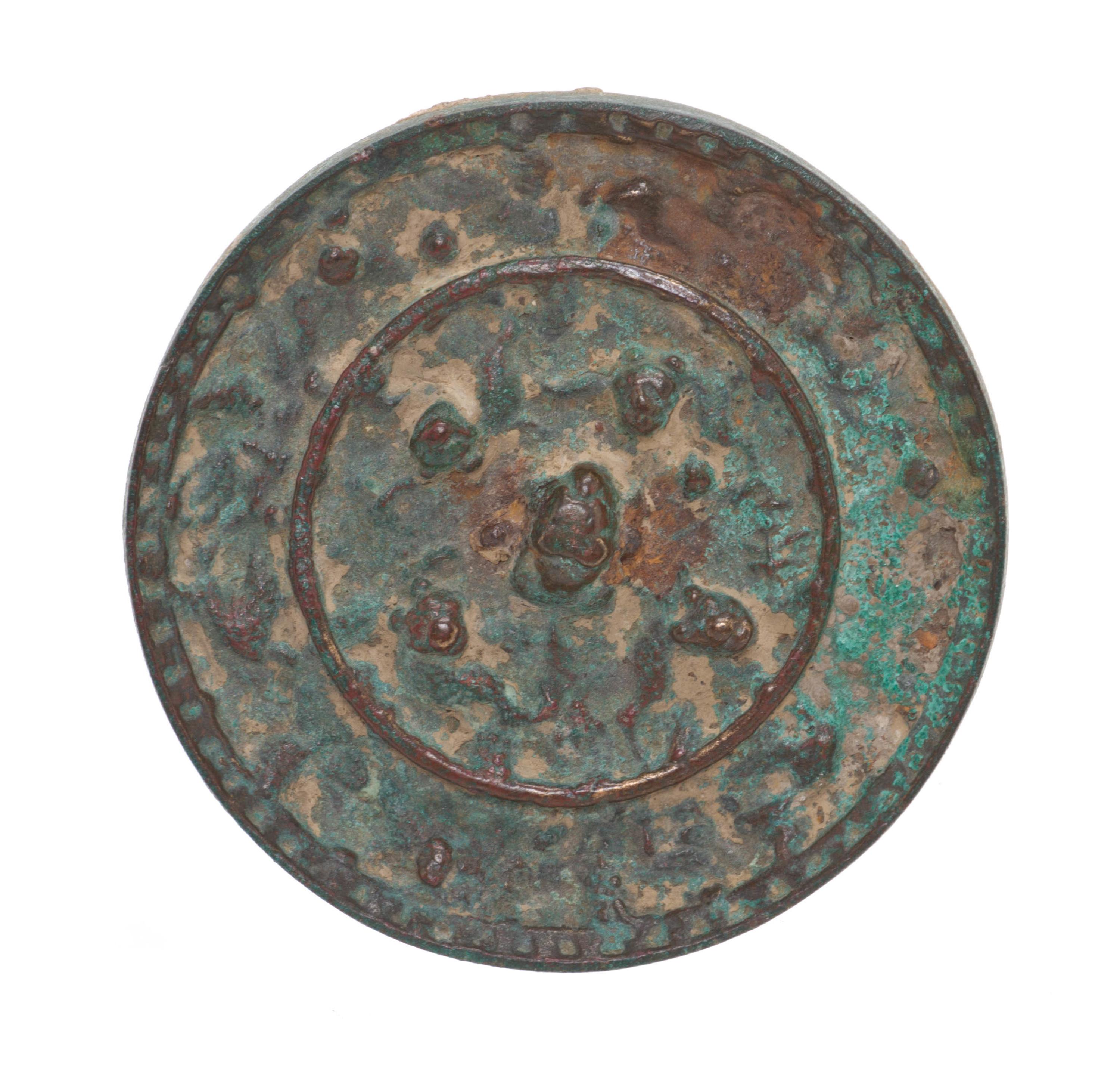 A Chinese Bronze Disc Mirror, Diameter 4 1/8 inches.