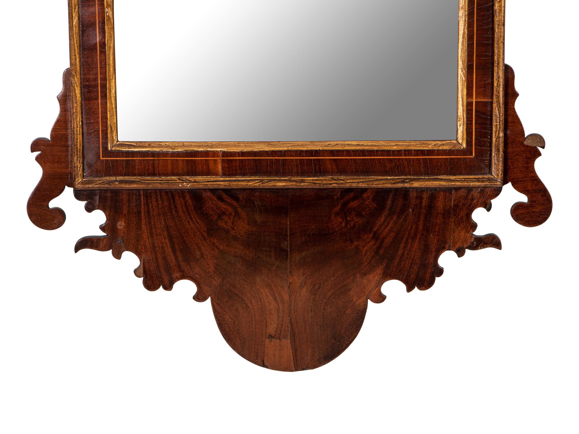 A George III Parcel Gilt Mahogany Mirror