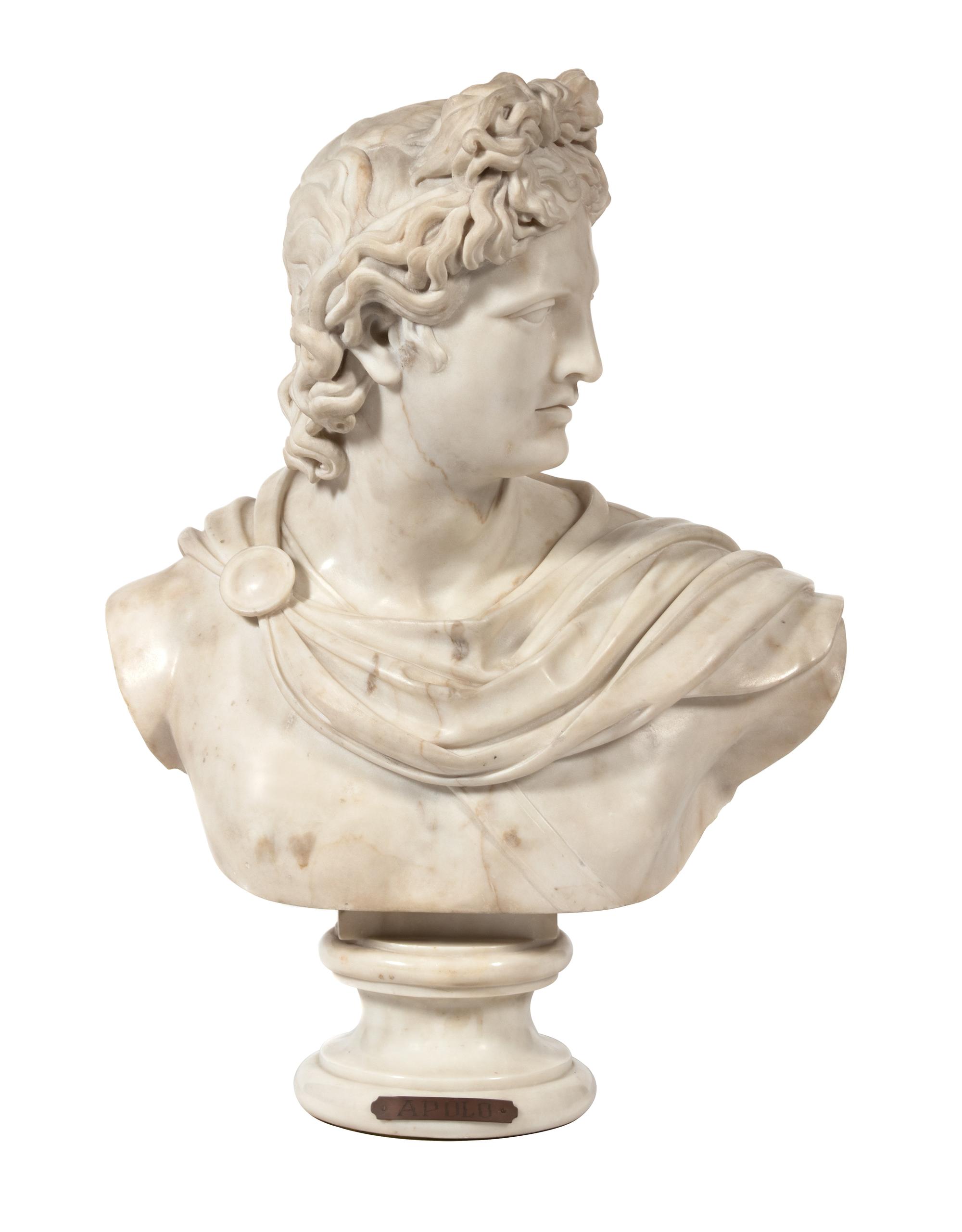 An Italian White Marble Bust of Apollo Height 32 x width 24 inches. — AFTER THE ANTIQUE/19TH CENTURY