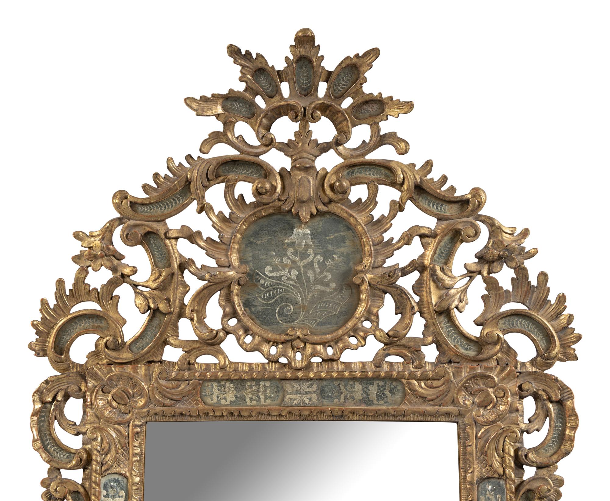 A Pair of Italian Baroque Style Giltwood and Etched Glass Mirrors