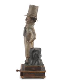 A Folk Art Carved Wood Elderly Gent Match Holder