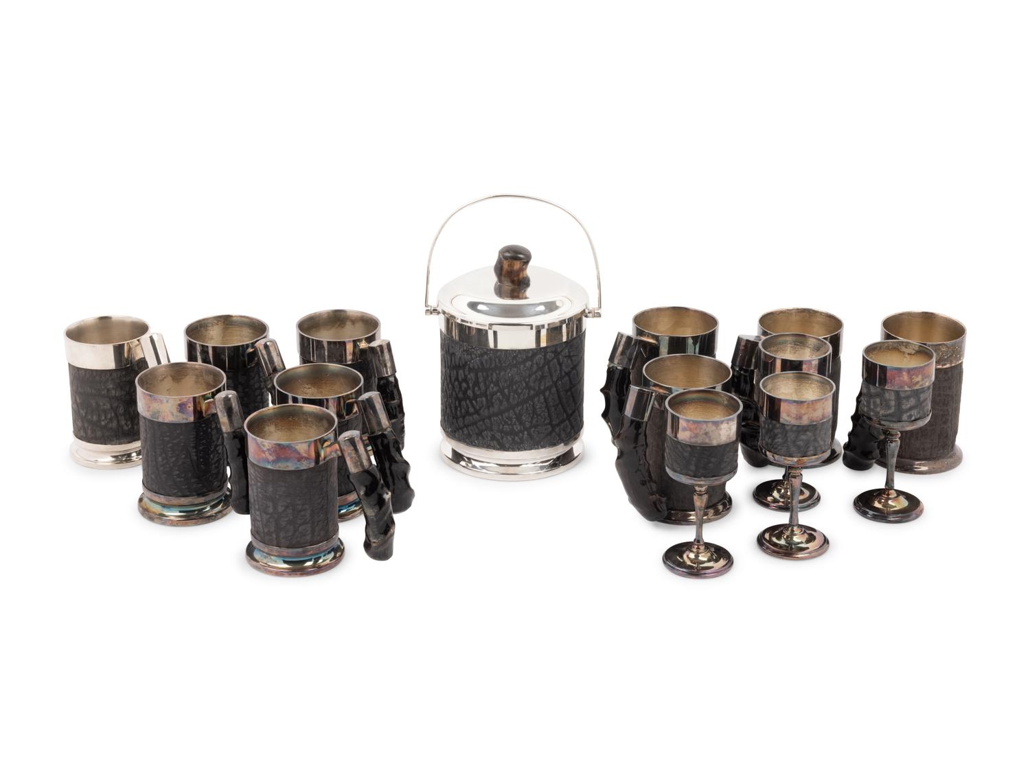 A Set of Silver-Plate and Hide Drinkware