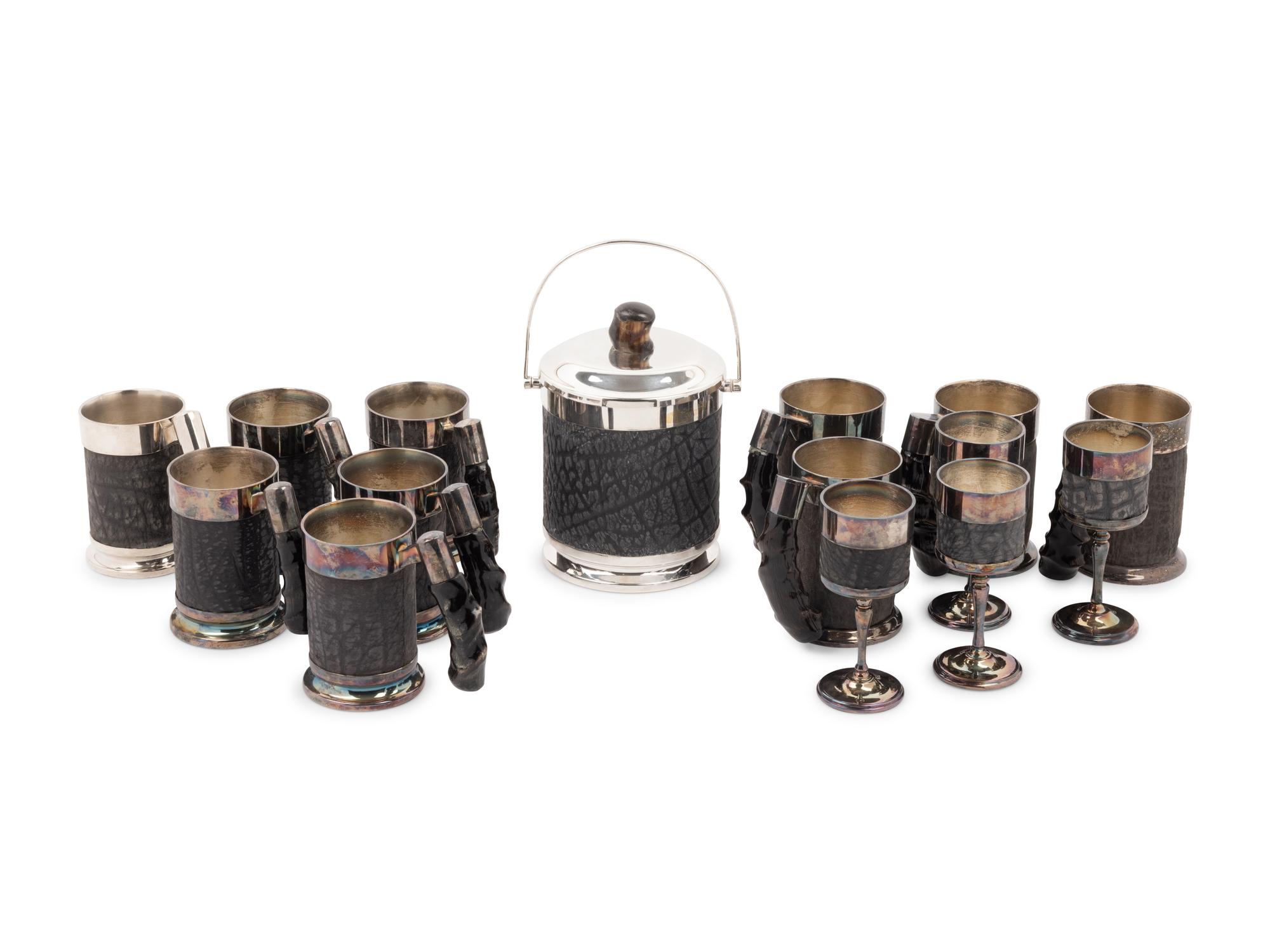 A Set of Silver-Plate and Hide Drinkware