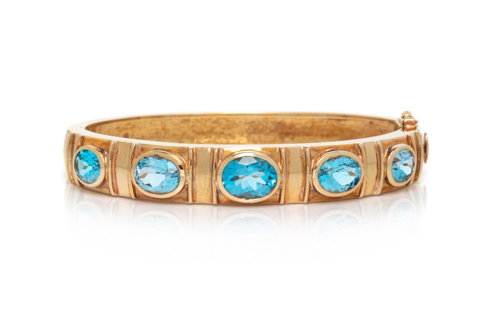 YELLOW GOLD AND BLUE TOPAZ BANGLE BRACELET