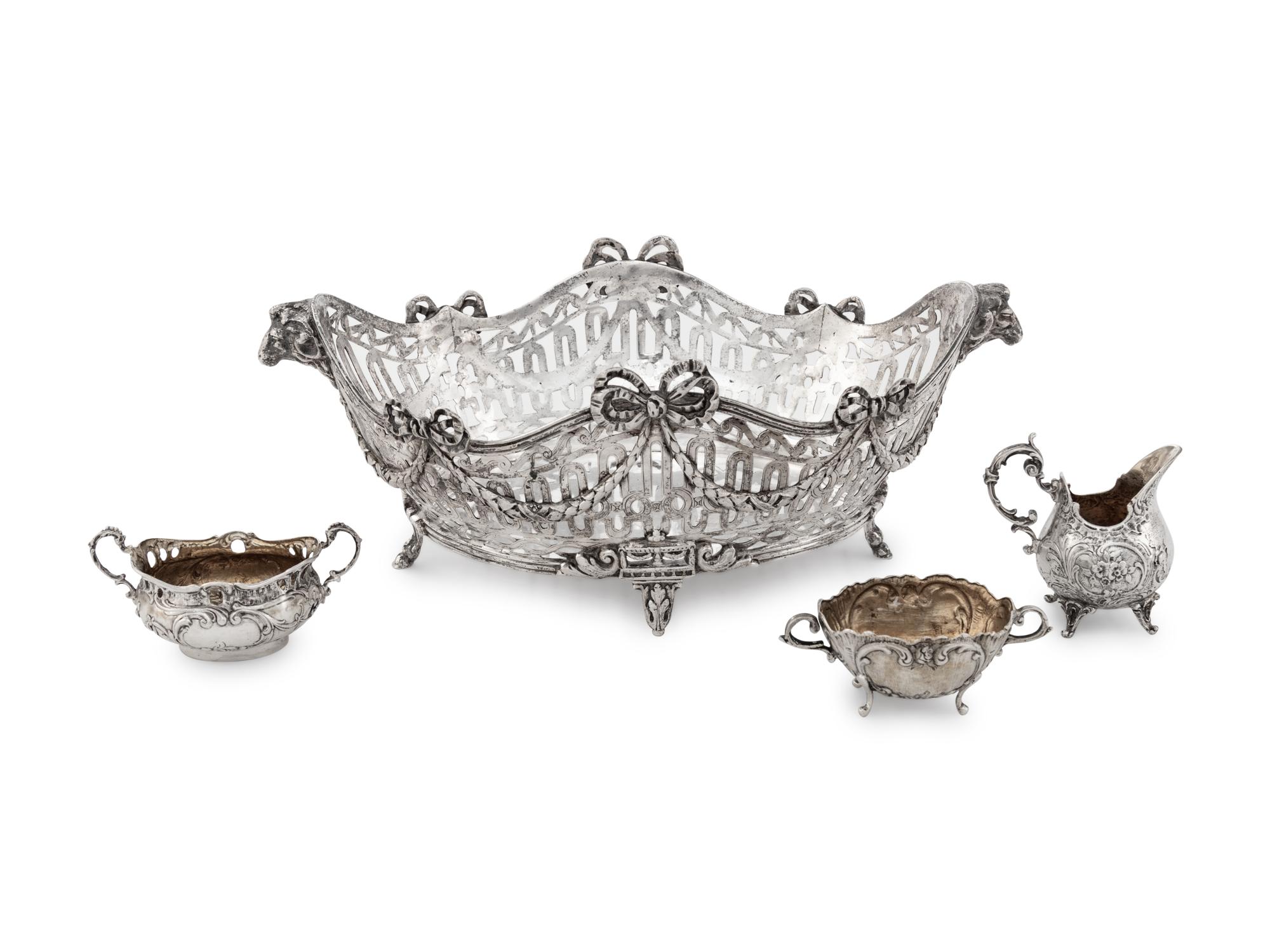 A Group of Four German Silver Table Articles