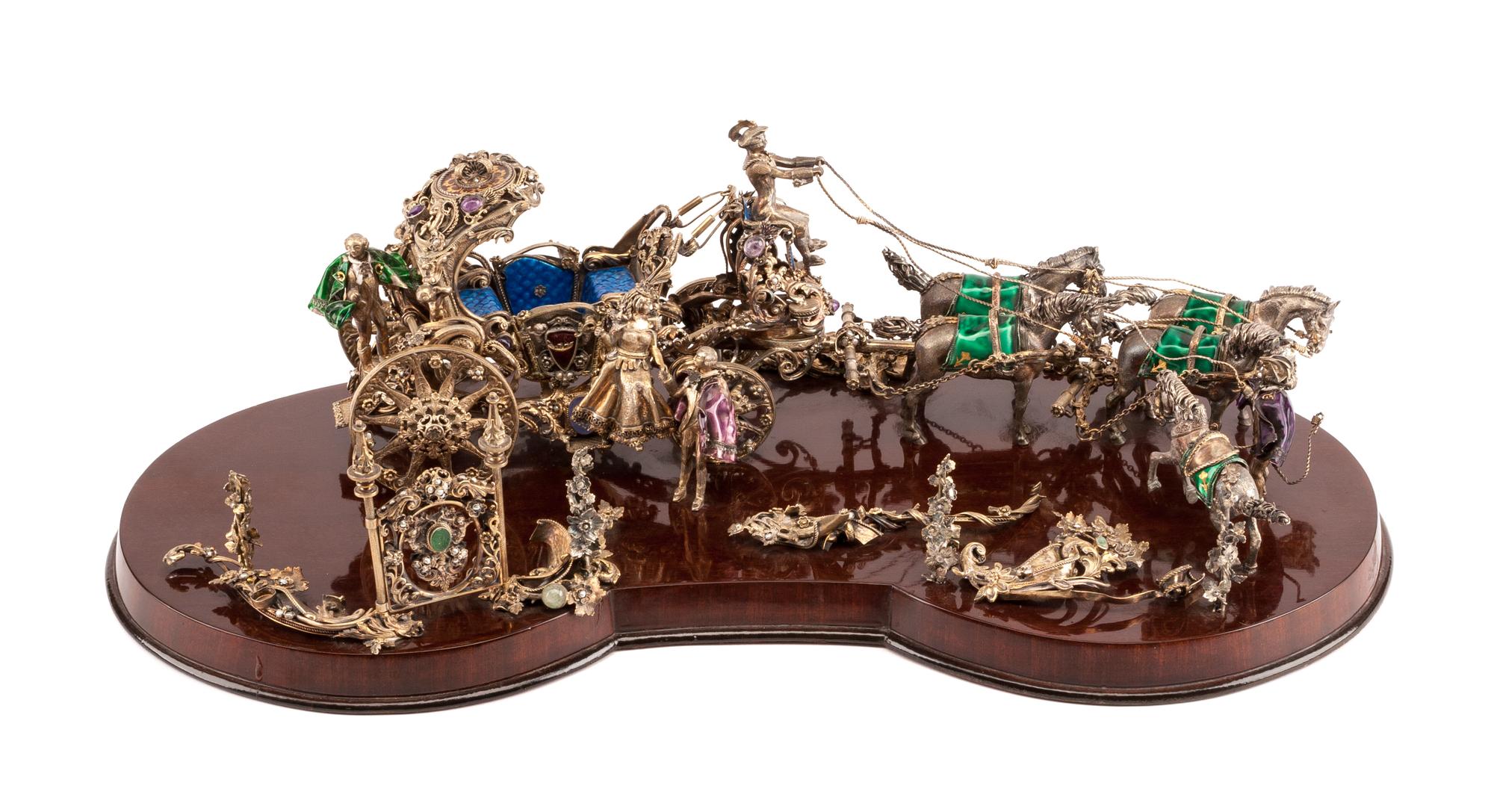 An Austrian 'Jeweled' and Enameled Silver Model of a Carriage, 20th Century, in the form of a coach lead by four horses.