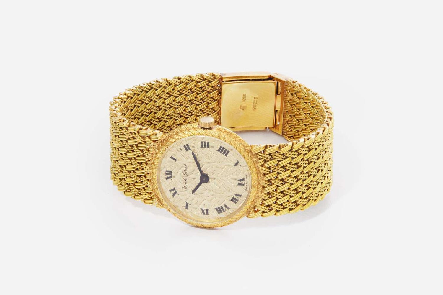 A Ladies 18K Yellow Gold Bueche Girod Watch
